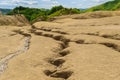 Buzau, Romania - June 29, 2019: People having fun at the Mud Volcanoes Reservation in Buzau, Paclele Mari